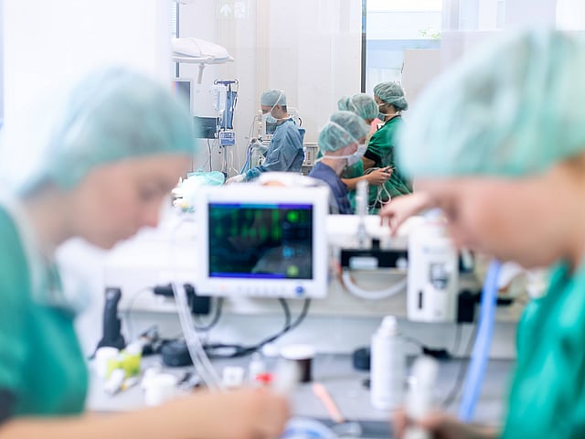 A group of people in a room.